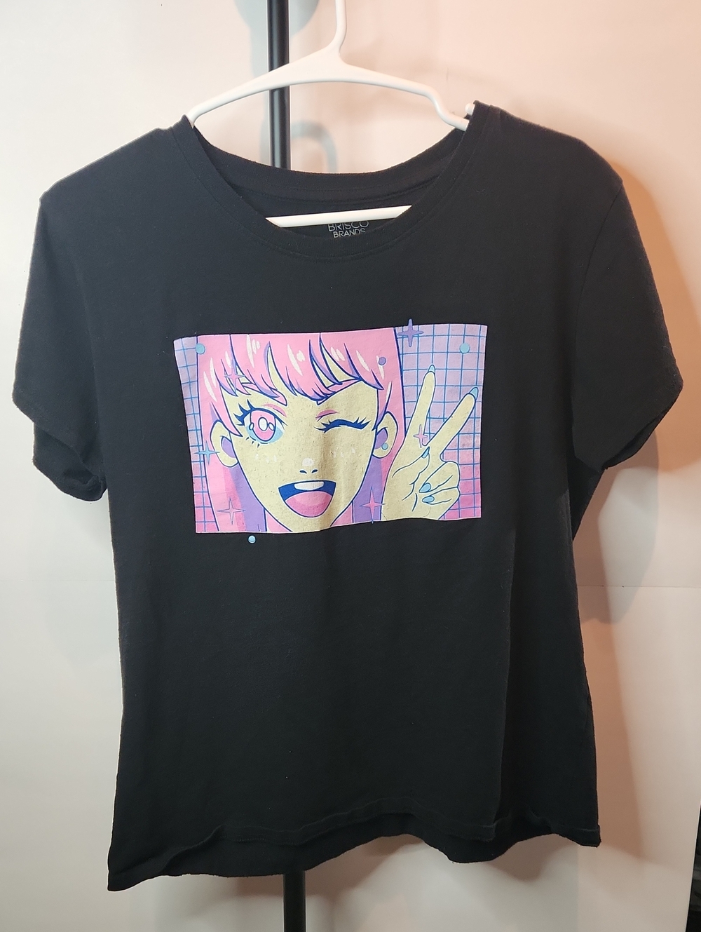 Girls junior size large Black Graphic Tee with Pink Anime Print. 0026
